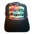 Colorful palm trees with a pink and black checkered mesh