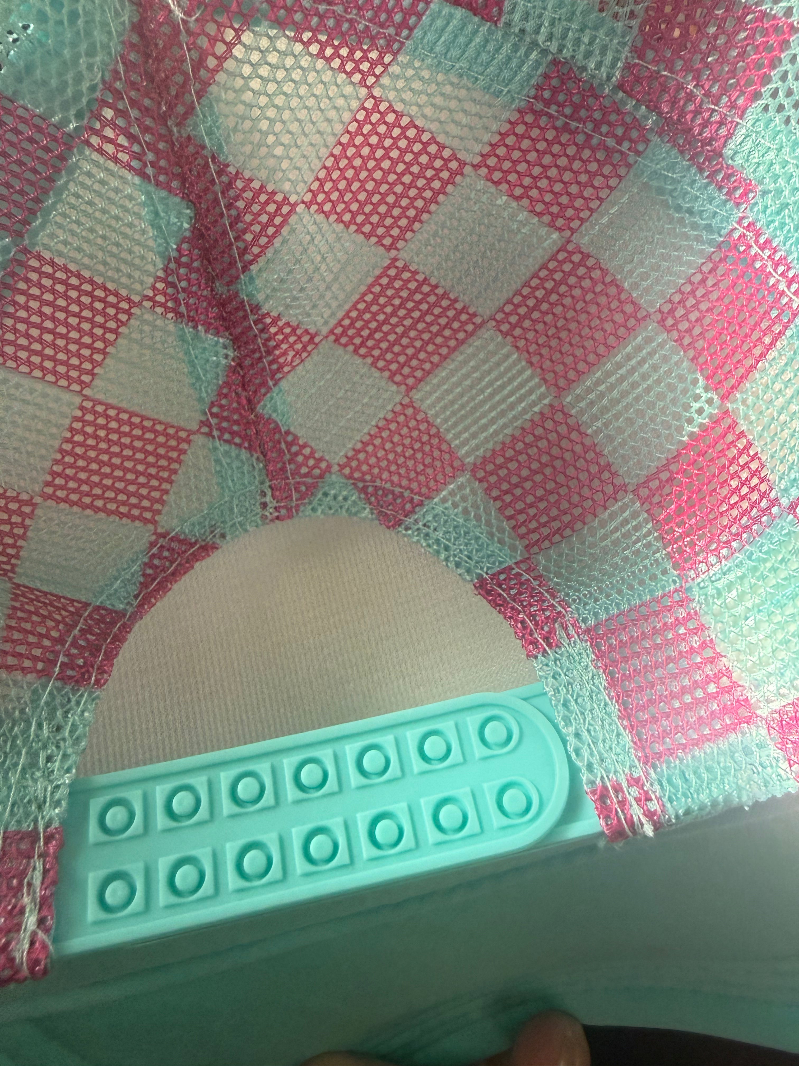 Running on Alani and a prayer checkered trucker hat
