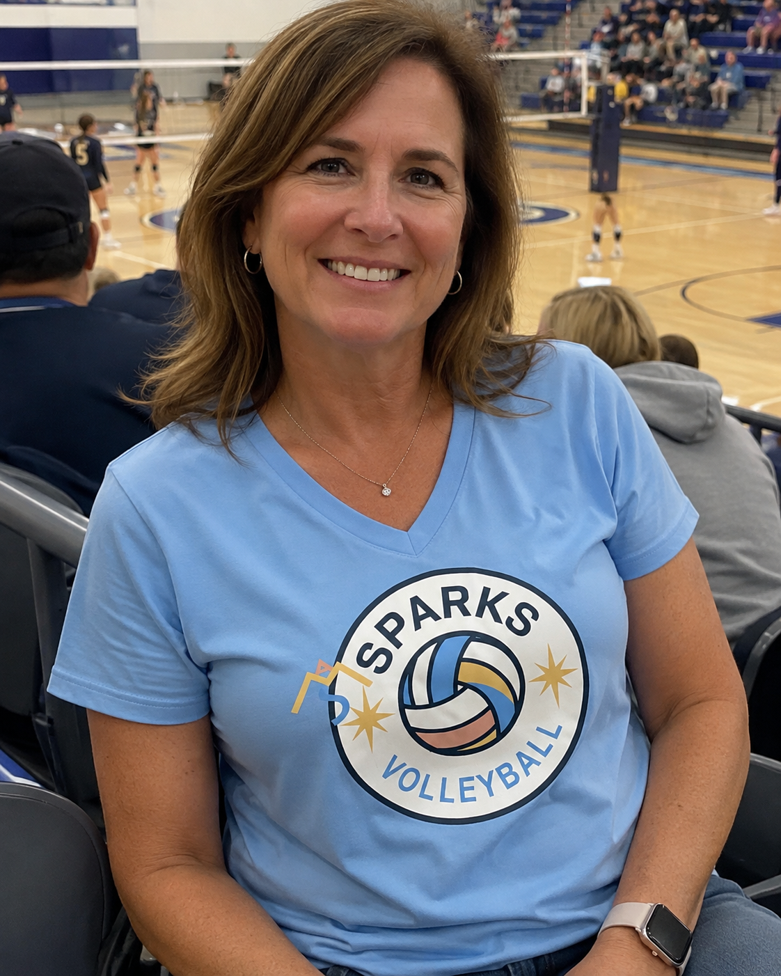 Columbia blue Vneck athletic shirt with cream Sparks circle and logo